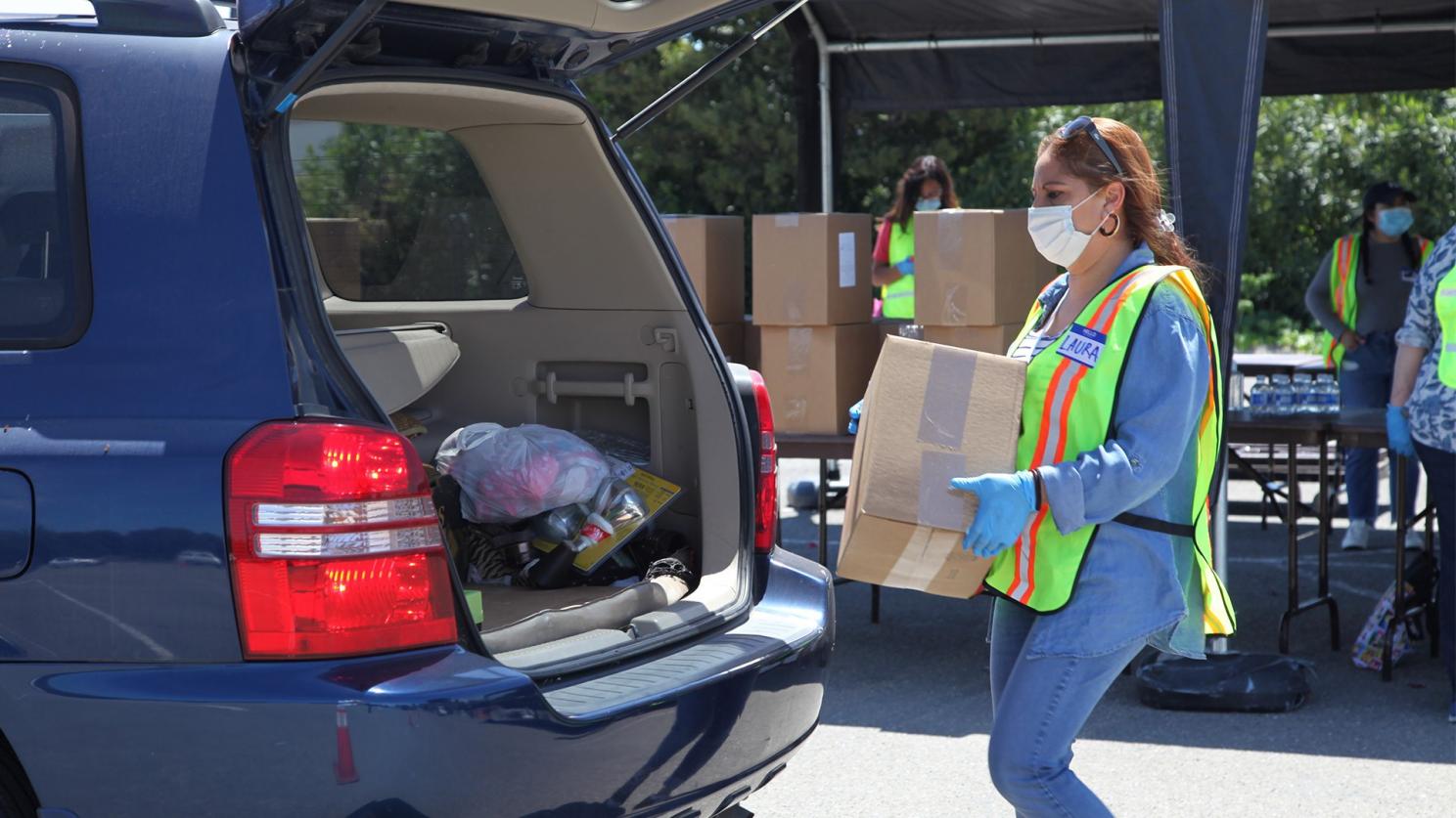woman loading a car