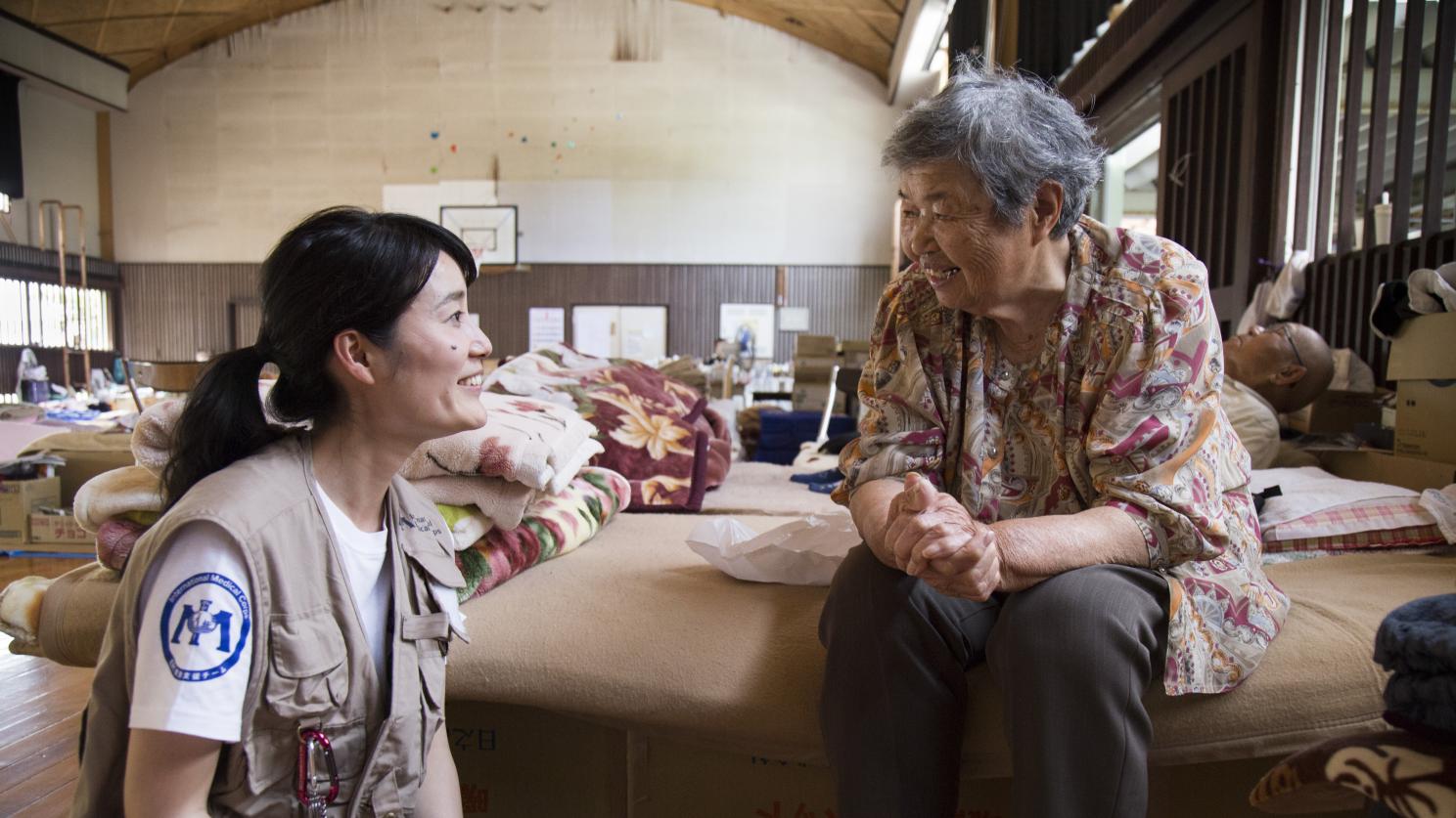 First responder talking to victim in Japan