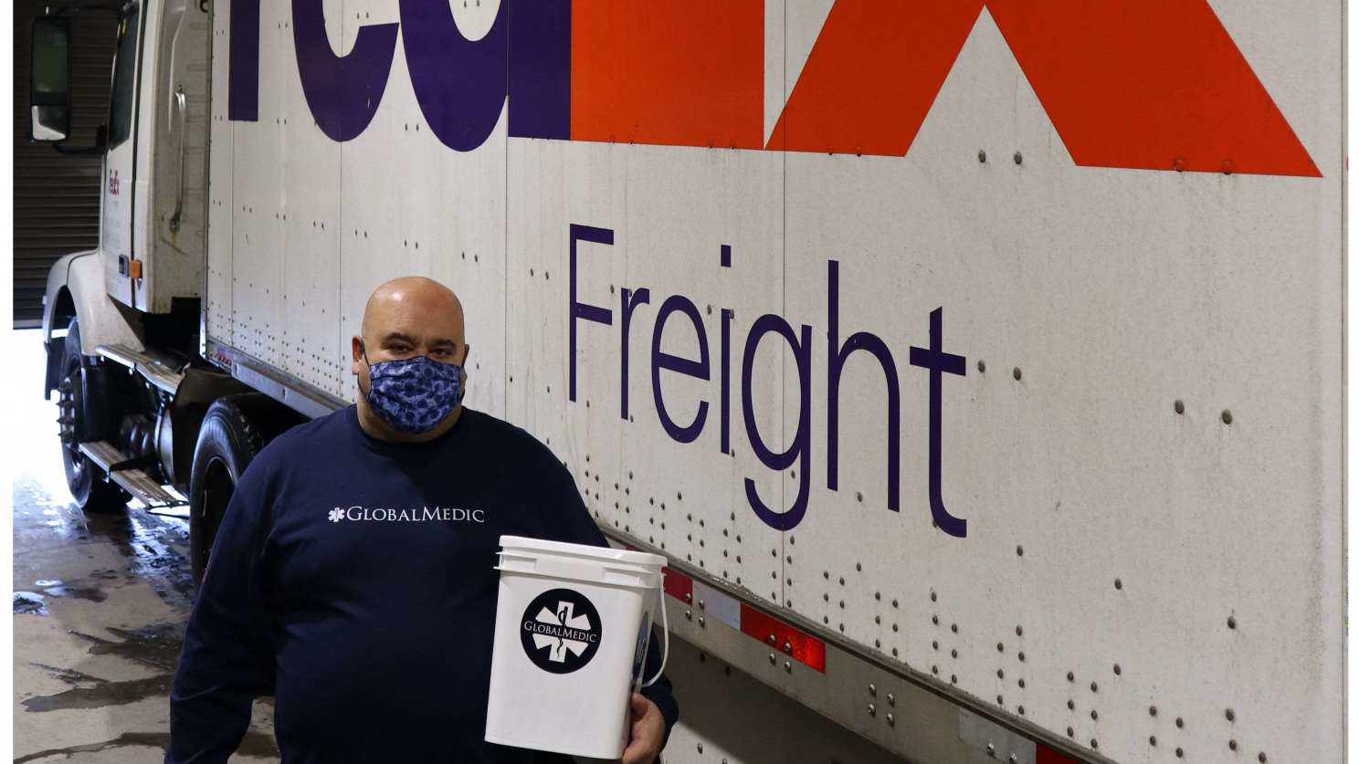 Freight truck with volunteer in front